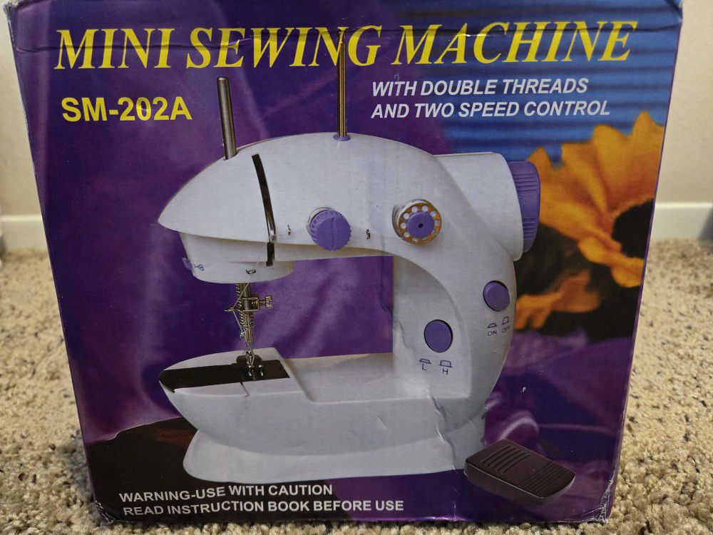 New mini sewing machine 
