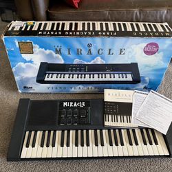 Miracle Piano with box and paperwork
