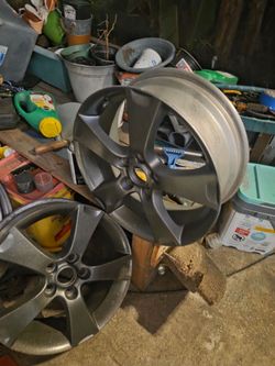 Nice mazda wheel, just got them painted in a midnight Grey, the out come are awesome all four wheels look good, they are size 17- 5 lugs  just wheels.