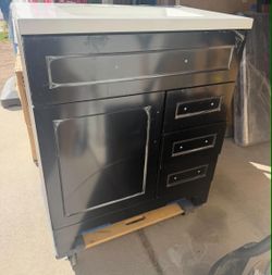 30" Bathroom Vanity new in black finish (front with plastic protection)