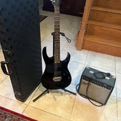 Ibanez Guitar W/ Hard Case And Fender Amp 