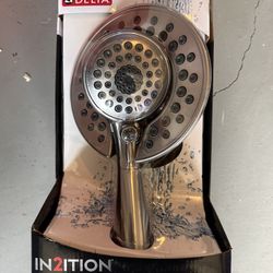 The Delta® In2ition® Two-in-One Shower features a detachablerr hand shower 