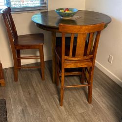 Indoor outdoor table with stools