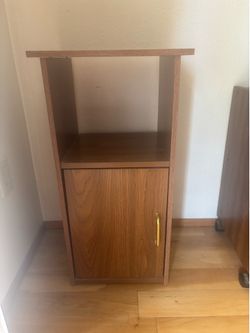 Small wooden stand with cabinet storage