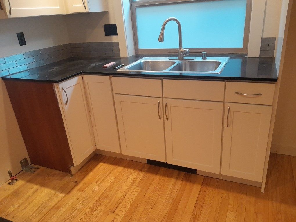 White Kitchen Cabinets, Sink & Garbage Disposal