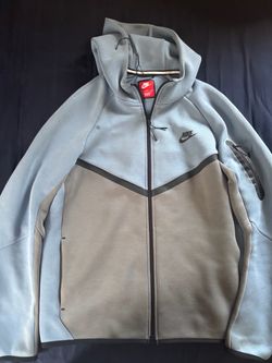 Light blue Nike tech jacket