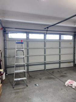 GARAGE DOOR CABLES OFF 
