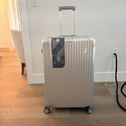 LARGE CHECKED SUITCASE