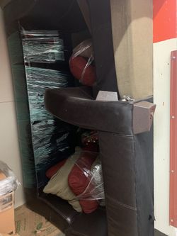 Mint condition sofa with a foot rest