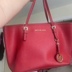 Red Michael Kors bags 