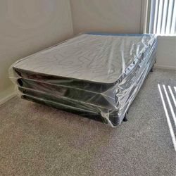 Queen mattress and boxsprings (NEW)