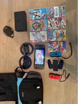 Nintendo Switch with games and extra joycons