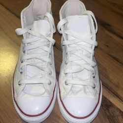 White Converse Chuck Taylor All Star High Top.