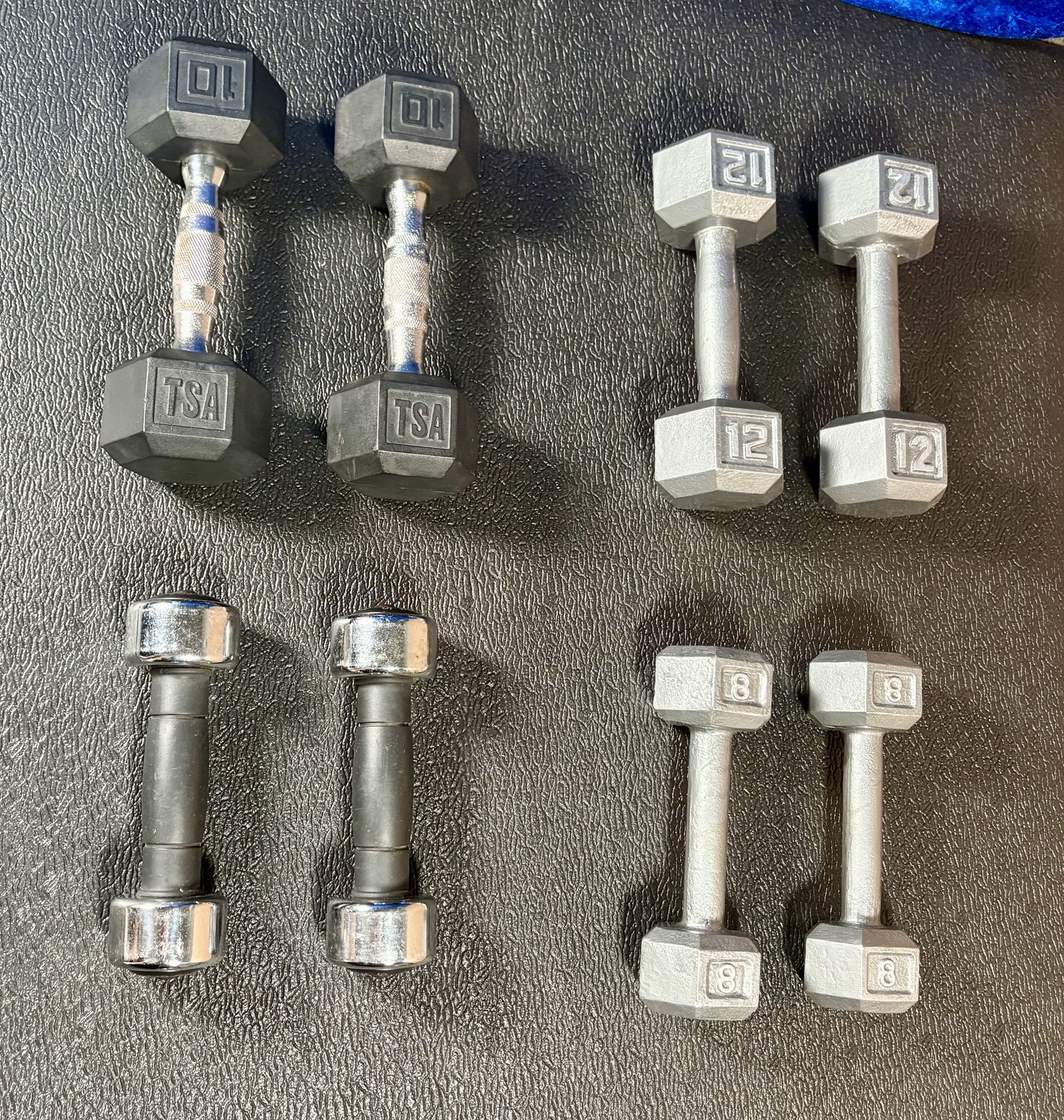 Set of Hex Cast Iron Dumbbells ( light) 12#, 10#, 8# and 5 #   In total: 70 pounds.