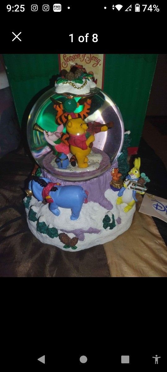 Disney 1997 Winnie the Pooh Season of Song Christmas snow globe.