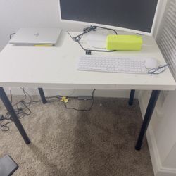 IKEA study table and  Plastic chairs for sale