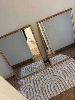 2 gold mirrors