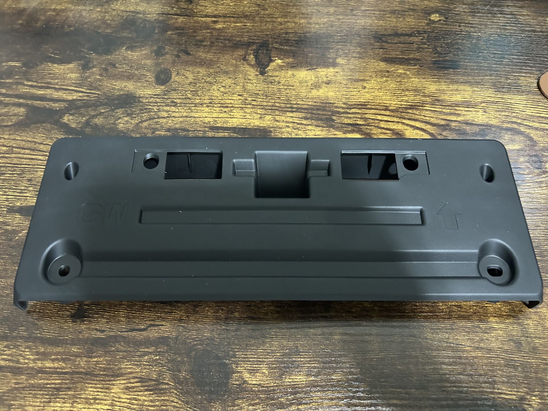 2018 - 2024 INFINITI QX80 FRONT LICENSE PLATE MOUNT BRACKET OEM