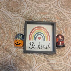 Snow Globes And A Sign