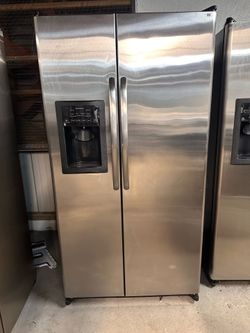 Ge side by side refrigerator-60 DAY WARRANTY
