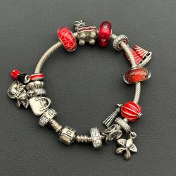 Jewelry Pandora 925 sterling silver gold tone 6.75” charm bracelet with 14 charms