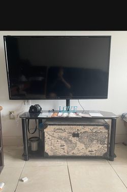 TV Stand on entertainment Table, WITH TV. 