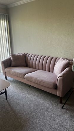 Light Pink Sofa with Matching Pillows