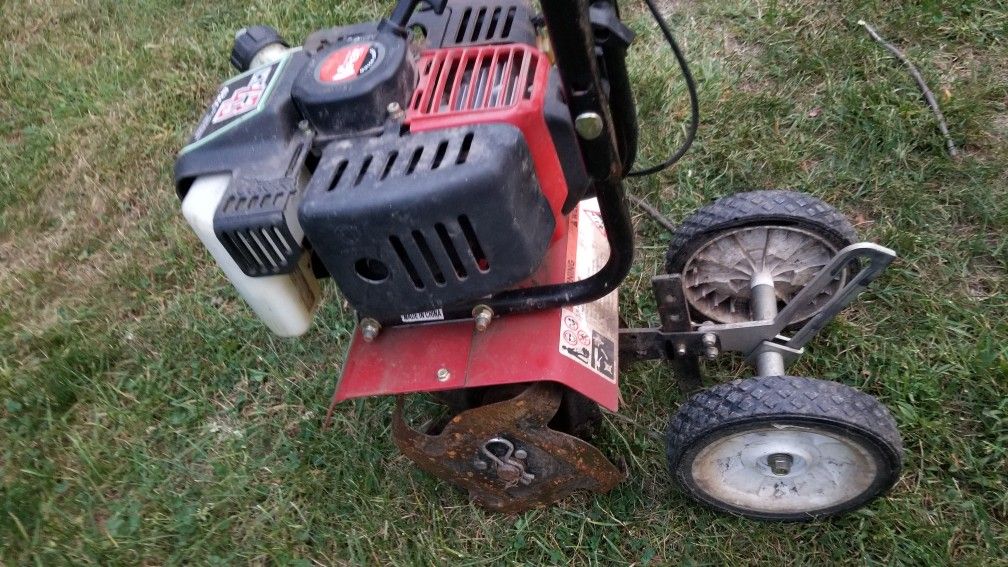 Earthquake mc43 mini cultivator tiller rototiller 43cc in working