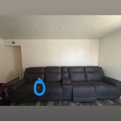 Grey reclining couch 