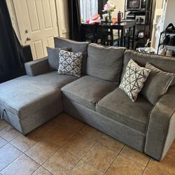 Grey Pullout Couch With Storage and Matching Pillows !