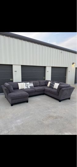 Ashley Furniture Dark Grey U Shaped Sectional Couch.$699 OBO