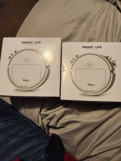 Two small Smart life robotic vacuums