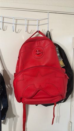 Red spray ground backpack