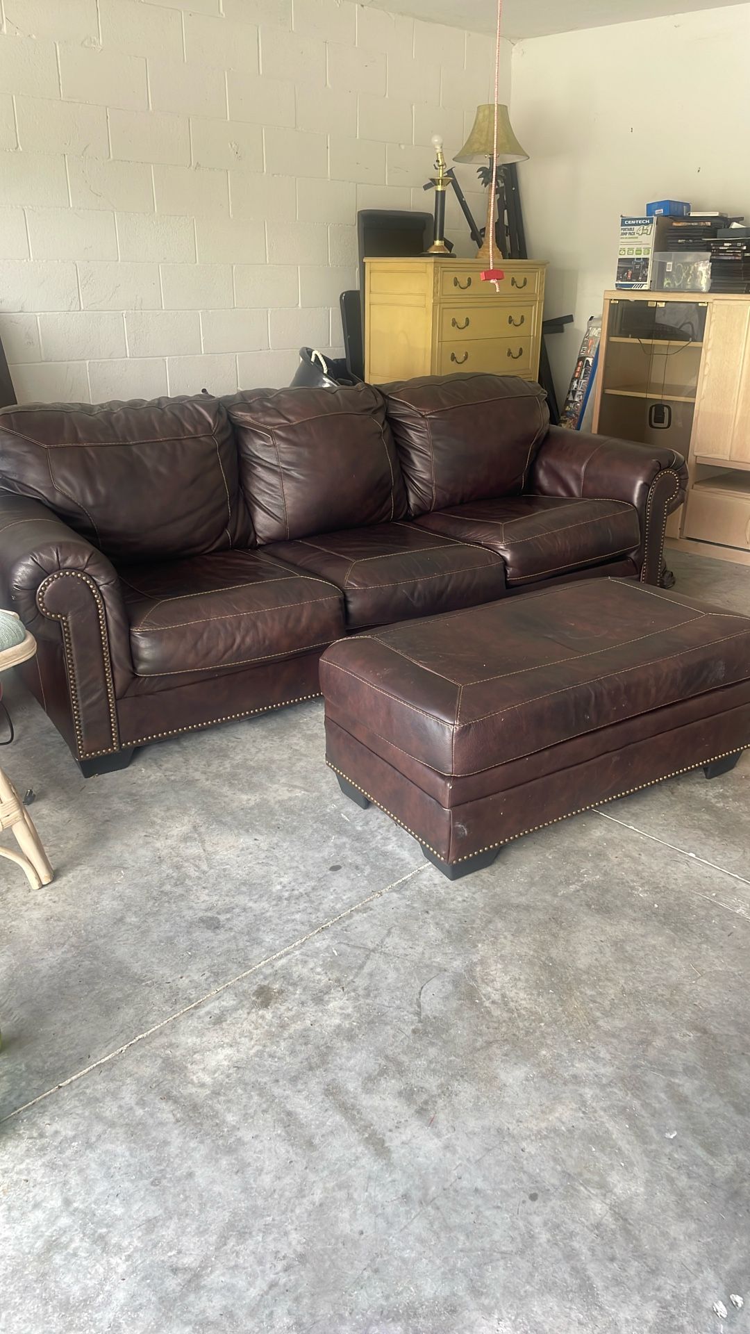 Leather couch with Ottoman