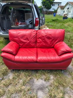 vibrant red leather loveseat