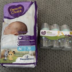 Newborn Diapers And Baby Bottles