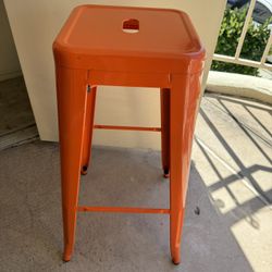 Three Orange Barstools