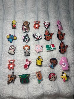25 Croc charms for $10