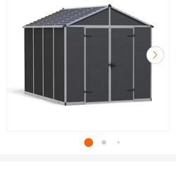 Brand New Canopia 8ftX10ft Polycarbonate Storage Shed.Brand New In Sealed Box. Never Opened.
