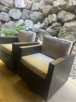 2 wicker brown swivel rocker conversation chairs