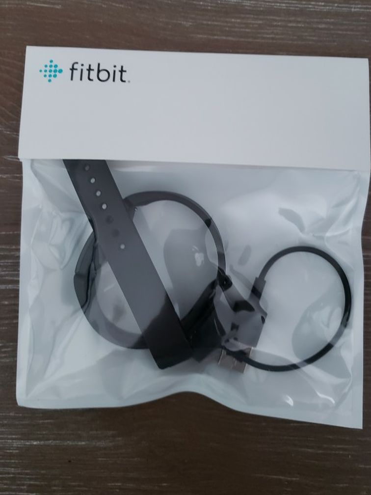 Fitbit Inspire Activity Tracker, Black New in Package, S and L Bands and Charger Included.