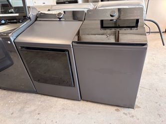 Black LG Topload washer and electric dryer