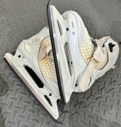 White and Gold Ice Skates