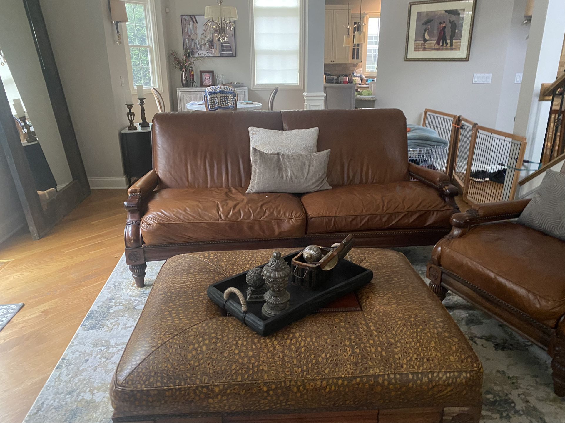 Leather Sofa , ottaman, and 2 Matching Chairs And Table 