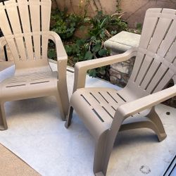 Two Plastic Deck Chairs -$20