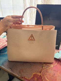 Semi-new Harry Potter Deathly Hallows Pink purse
