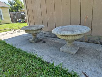 Nice Used Two outdoor concrete planters.  13in wide.