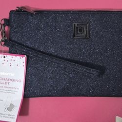 NEW- Liz Claiborne Phone Charging Wristlet Wallet in a navy blue glitter finish. It includes a removable USB power bank.