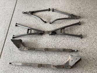 Polaris RZR upper and lower front high clearance A arms and rear trailing arms.