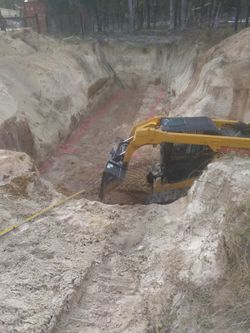 Heavy equipment excavation land clearing